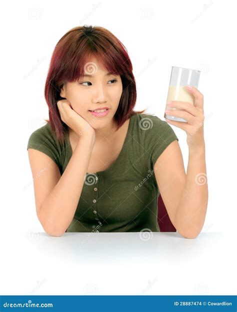 Young Asian Woman with a Glass of Milk Stock Photo - Image of young