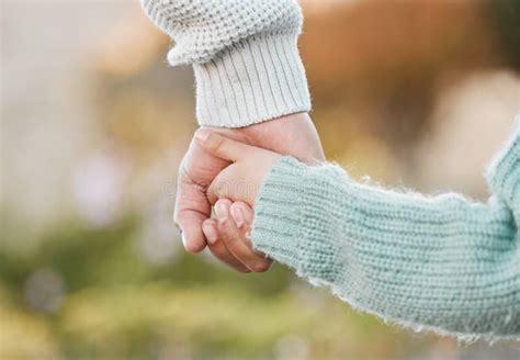 Love is the String that Ties Families Together. Shot of a Man Holding ...