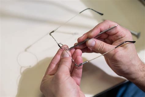 premium photo cropped hand  person holding cable