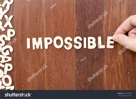 word impossible  block wooden letters stock photo