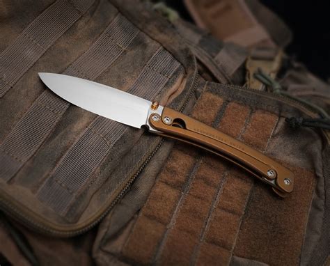 Folder "LEVER" knife with titanium handle on Behance