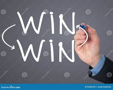 businessman hand drawing win win situation concept  marker  stock