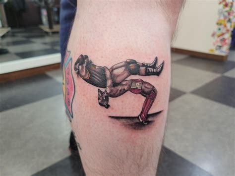 I always wanted a wrestling tattoo, so here's Bryan Danielson suplexing ...