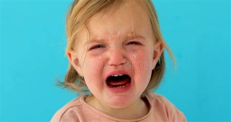year  baby cries stock photo image  person