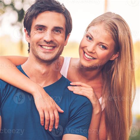 Happy loving couple. Portrait of beautiful young loving couple smiling