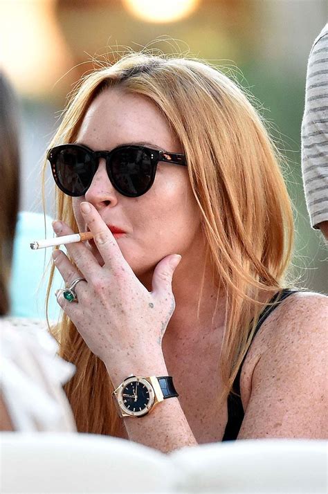 Not So Maternal! Pregnant Lindsay Lohan Caught Smoking AGAIN