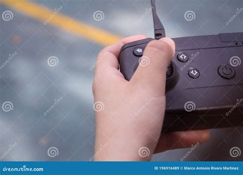 hand holding  control stock image image  field