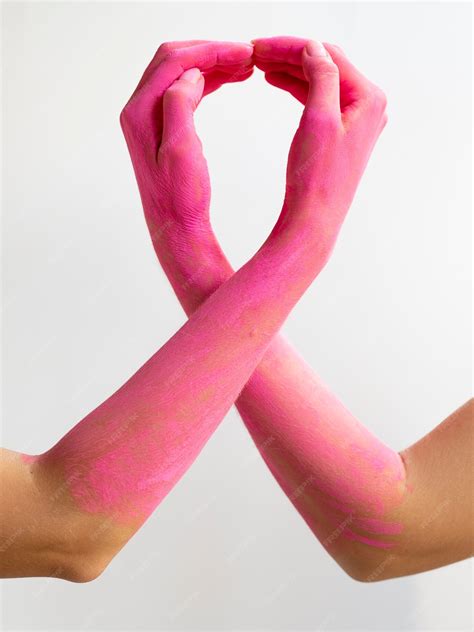 Free Photo | Close-up pink painted arms expressing awareness