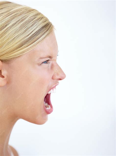 Premium Photo | Angry face profile or woman screaming in studio at