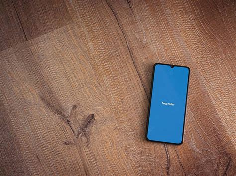 Black Display Featuring The Truecaller App Logo On Its Launch Screen ...