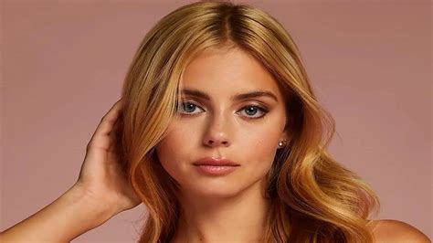 Mishel Gerzig stuns in lace bralet as she praises husband Courtois for ...