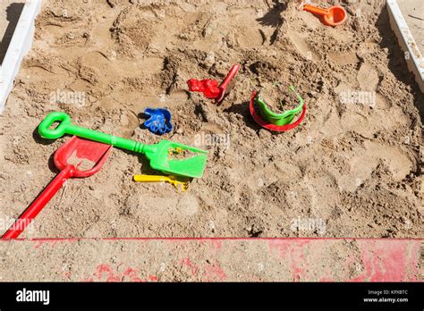 sandbox with toys on children playground Stock Photo - Alamy