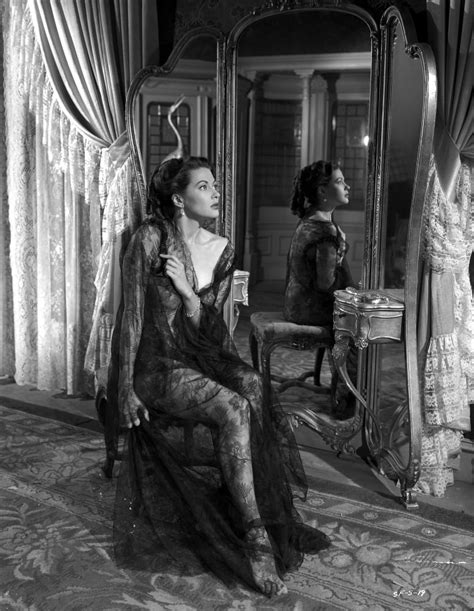 Yvonne Decarlo Facing Side View in Black Dress in Black and White Photo