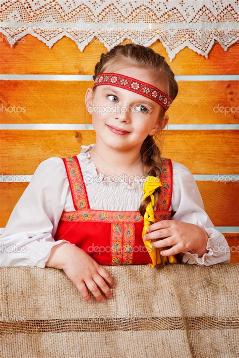 Girl in a national sarafan Stock Photo by ©Chirtsova 25058921
