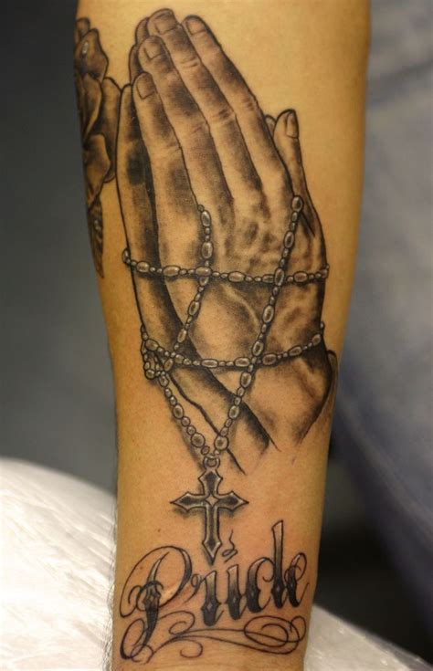 Rosary beads and praying hands Tattoo | Hand tattoos, Hand tattoos for ...