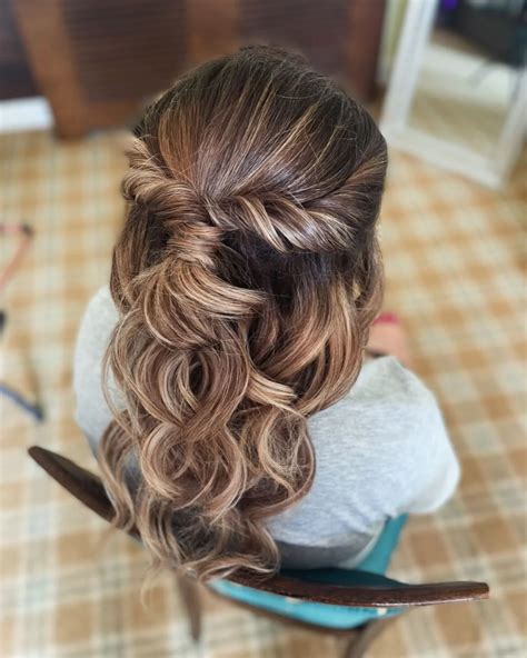 Brides are choosing these elegant updo hairstyles for long hair 3