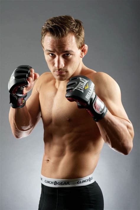 mma fighter ready  fight solid muscular body built  fighting