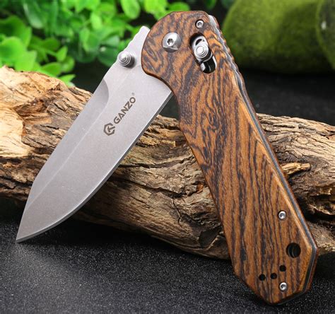 Steel Reviews: New Ganzo folders with wood and CF handle at GearBest