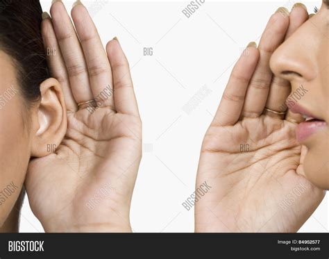 woman whispering  image photo  trial bigstock