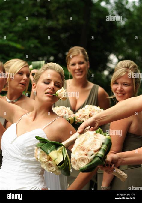 portrait of bride having fun with brides maids Stock Photo - Alamy