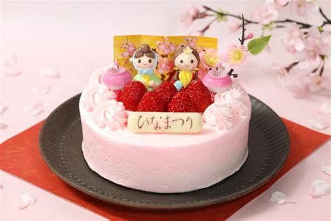 pastel "hinamatsuri decoration cake" with bonbori shaped candles ...