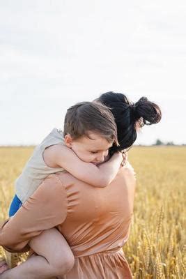 Child Hug Stock Photos, Images and Backgrounds for Free Download