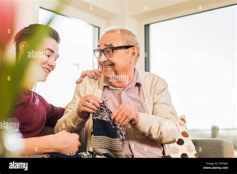 grandfather  grandson  knitting stock photo alamy