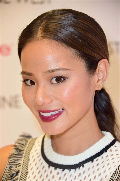 Download Jamie Chung posing in a stylish outfit Wallpaper | Wallpapers.com