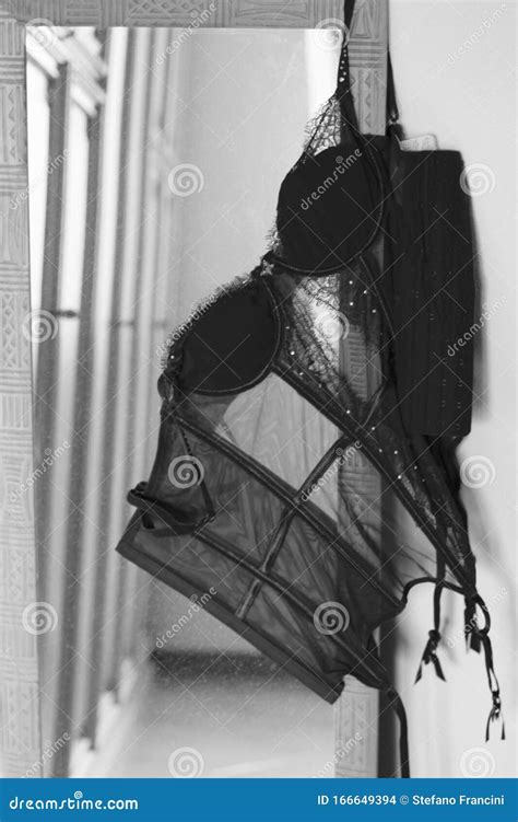 Corset in Front of a Mirror Stock Photo - Image of romantic, mistress ...