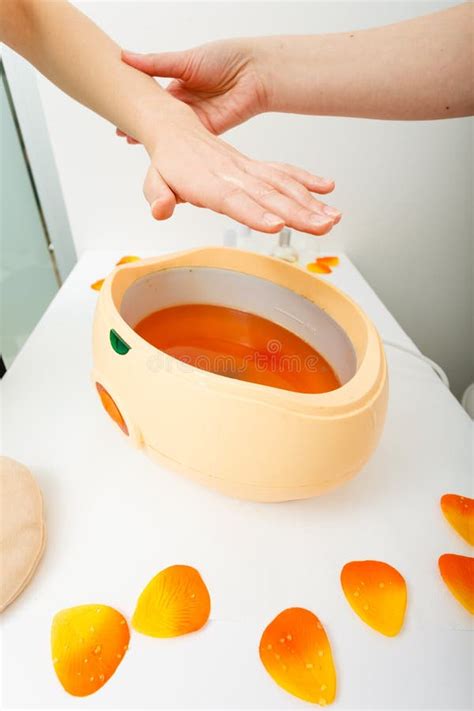 Paraffin hand treatment stock image. Image of peaceful - 41302689