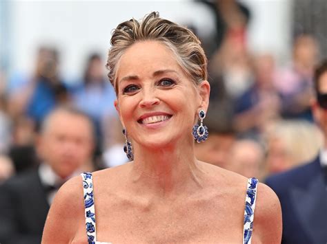 Sharon Stone Shows Off Gray Hair While in a Daring Red Swimsuit