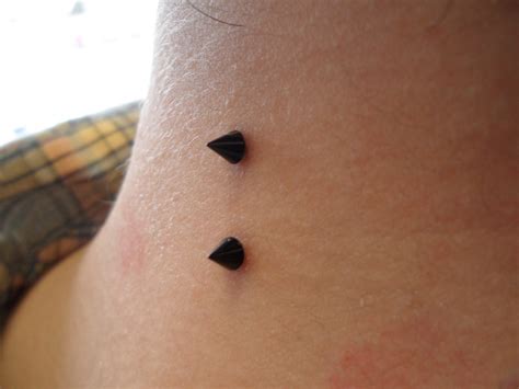Microdermal Back Dimple Piercing