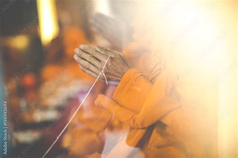 Buddhist monks praying hands in thai ceremony Stock Photo | Adobe Stock