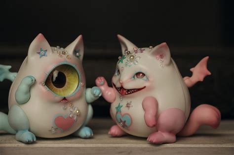 Ceramic Figurines with Eye on Shelf