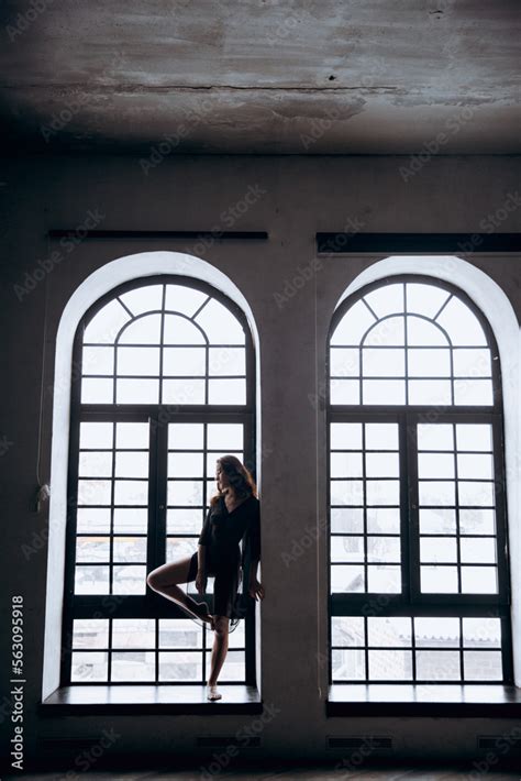 Beautiful, natural naked girl artistic posing at a stylish and ...