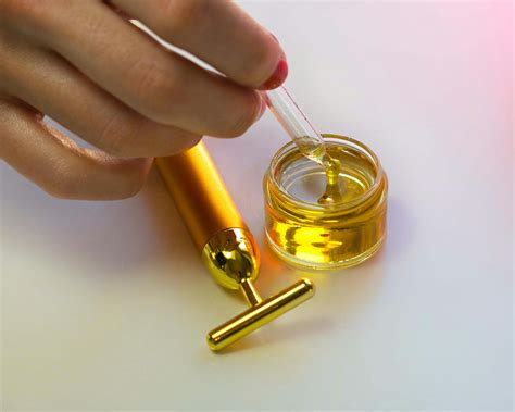 person holding  dropper  stock photo