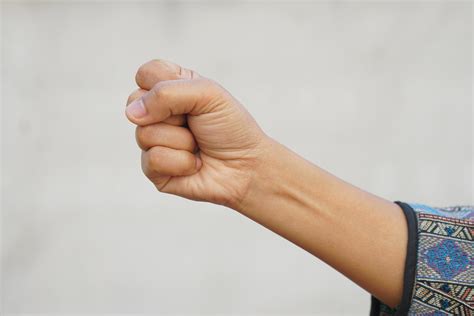 human hand making  strong sign  stock photo  vecteezy
