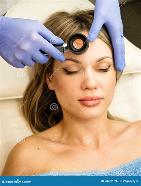 Dermatologist Examines Moles and Birthmarks Stock Photo - Image of