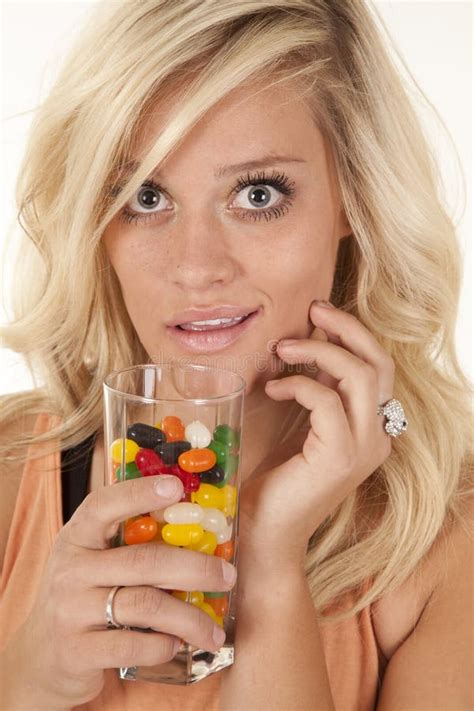 Woman smile glass of candy stock photo. Image of dessert - 22030238