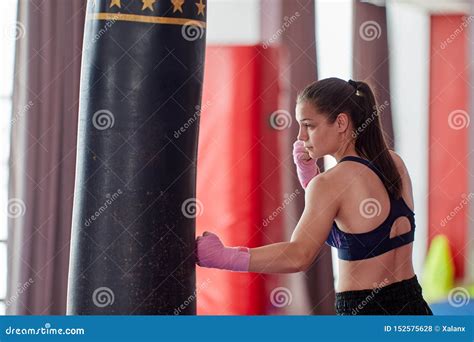 Kickboxing Girl Training with Heavy Bag Stock Photo - Image of punch ...