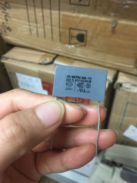 10pcs-New-and-original-333K-MKP63-333J-300V-0-033uF-P22-5Mm.jpg