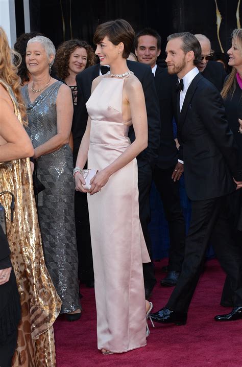 Why Anne Hathaway Was Wearing A Dress That Made It Look Like She Had A