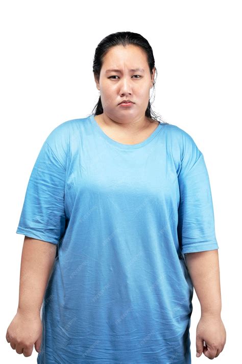 Mujer gorda asiática con sobrepeso con una expresión divertida | Foto