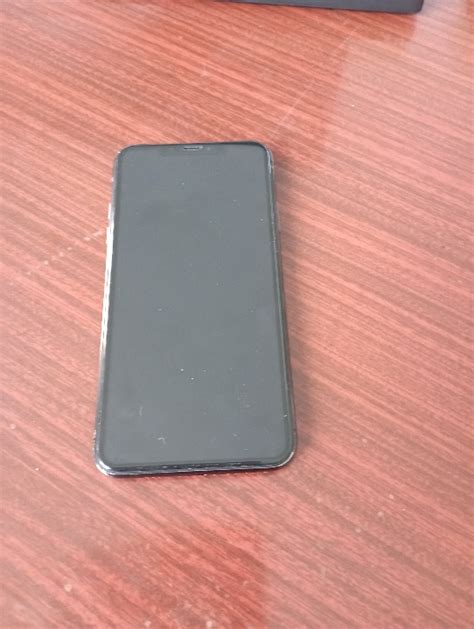 Телефон марки IPhone 11 Pro Max, у корпусі чорного кольору, бувший у ...