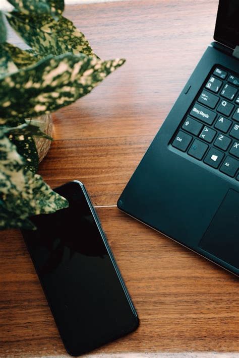Gray Scale Photography of Macbook Iphone Notebook on Table · Free Stock ...