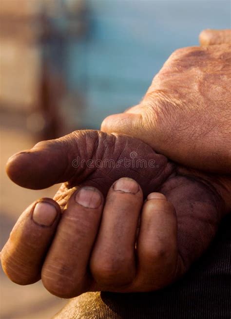 The Hands of Men Resting after a Grueling Work Stock Image - Image of ...