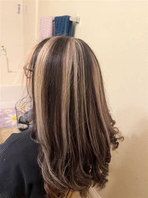 Stylists are split on the return of 90s chunky red highlights 2