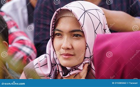 muslim woman wearing hijab   religious event focus  selected