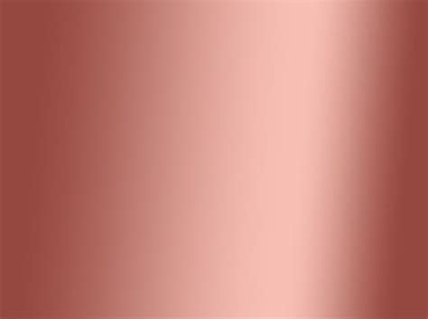 a close up view of a shiny metal surface with red and pink highlights on it