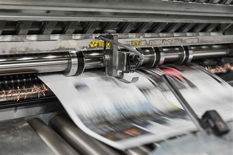 printing machine closeup newspaper printer machine printing